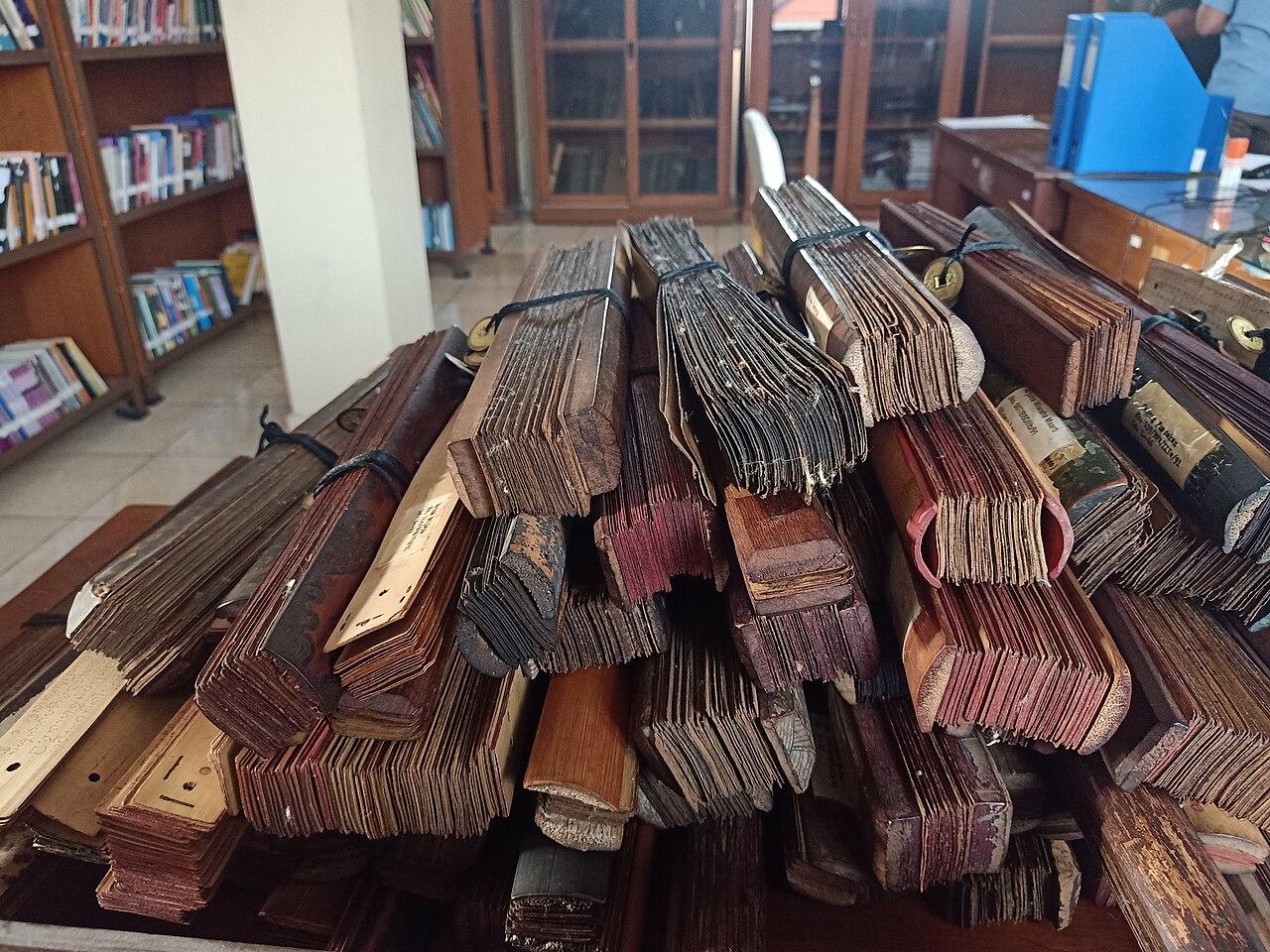 Stacks of palm-leaf lontar manuscripts